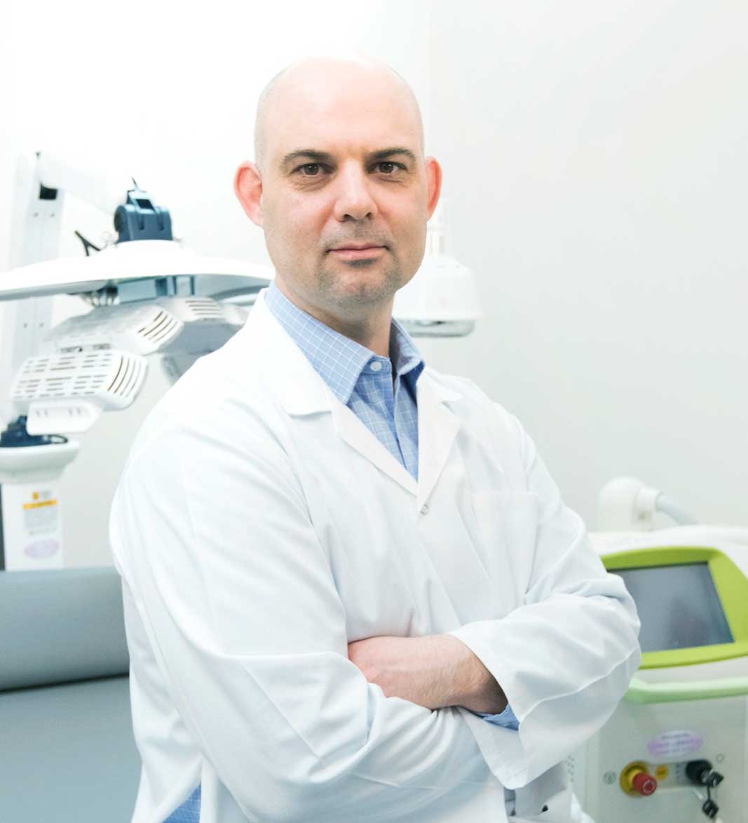 Dr. Breslavets with surgical loupes