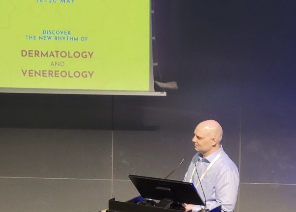 Dr. Breslavets giving a talk at EADV symposium in Seville, Spain (2023)